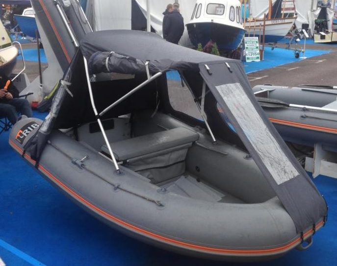 Inflatable raft with sales canopy